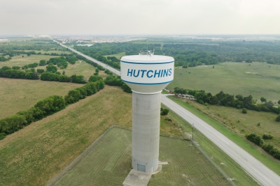 Photo of the water tower surrounded by green fields